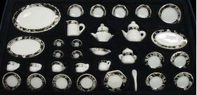 Ceramic Dinner Set, Black/White Daisy Trim, 35 Pieces (Felt Tray and Box with Plastic Top)