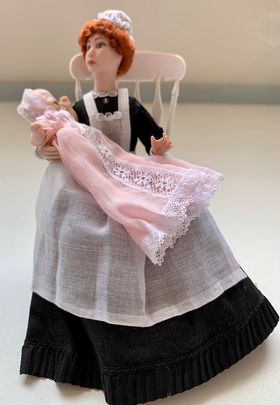 Mother with Baby in Rocking Chair (60W x 110D x 105Hmm) by Debra Hammond