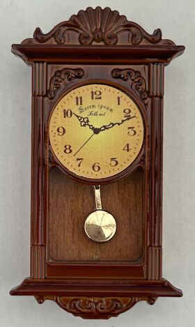 Clock Large Brown (60H x 34W x 12Dmm)